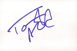 Tom Arnold autograph