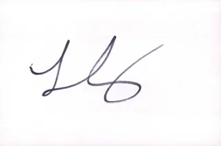 Lizzy Caplan autograph