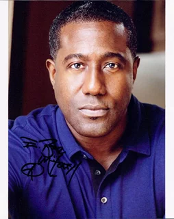 E. Roger Mitchell autograph