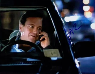 Tom Arnold autograph