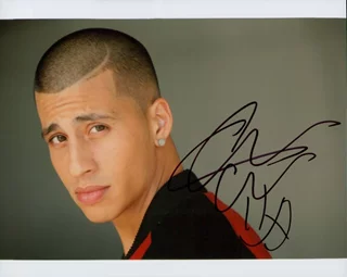 Carlito Olivero autograph