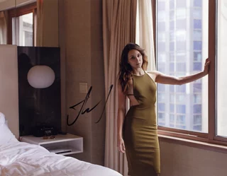 Troian Bellisario autograph