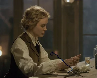 Dominique McElligott autograph