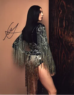 Troian Bellisario autograph