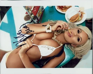 Kina Tavarozi autograph