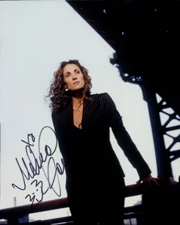 Melina Kanakaredes autograph