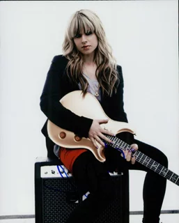 Orianthi Panagaris autograph