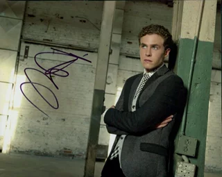 Iain De Caestecker autograph