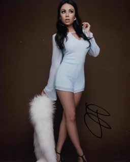 Janel Parrish autograph
