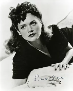 Simone Simon autograph
