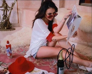 Janel Parrish autograph