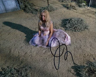 Janel Parrish autograph