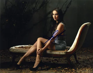 Troian Bellisario autograph