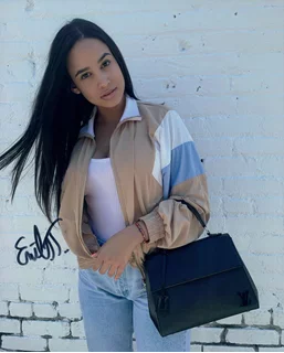 Emily Tosta autograph