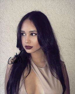 Emily Tosta autograph