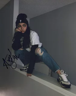 Avani Gregg autograph