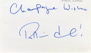 Robin Leach autograph