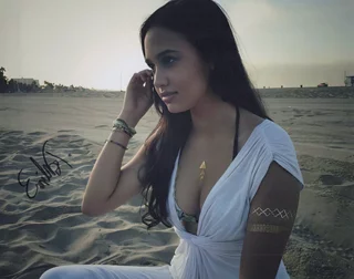 Emily Tosta autograph