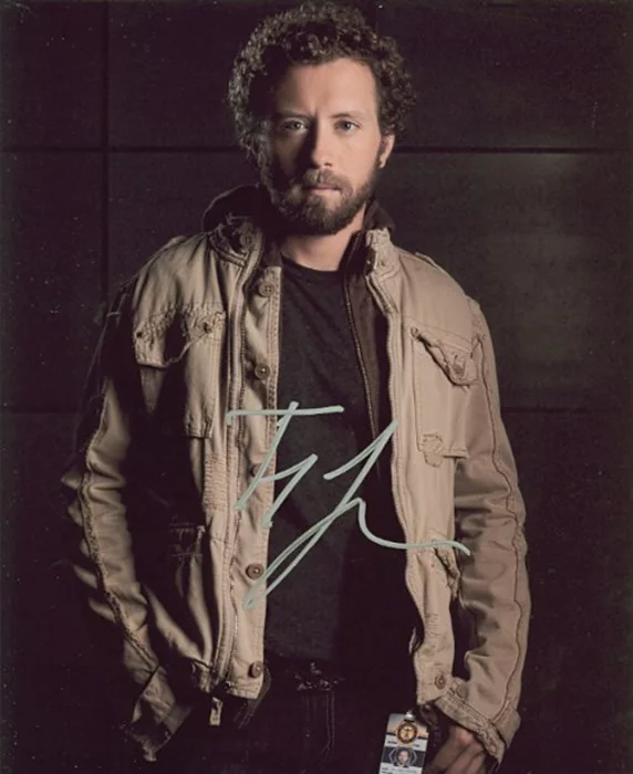 T.J. Thyne autograph