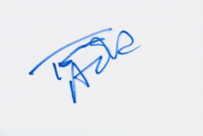 Tom Arnold autograph