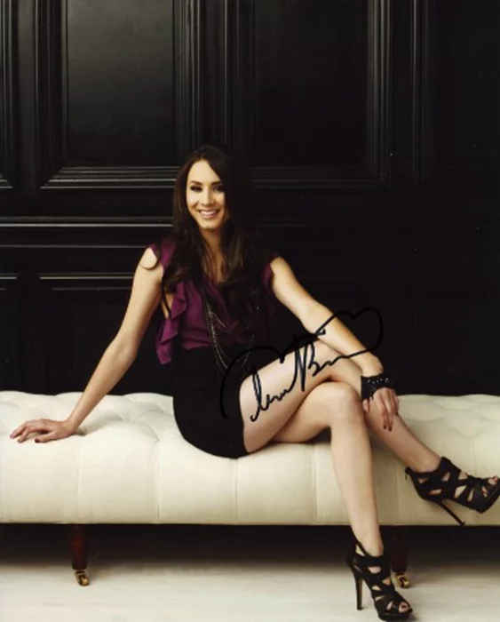 Troian Bellisario autograph