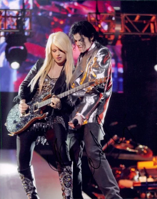Orianthi Panagaris autograph