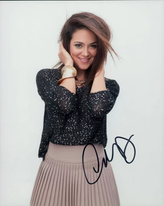 Camille Guaty autograph