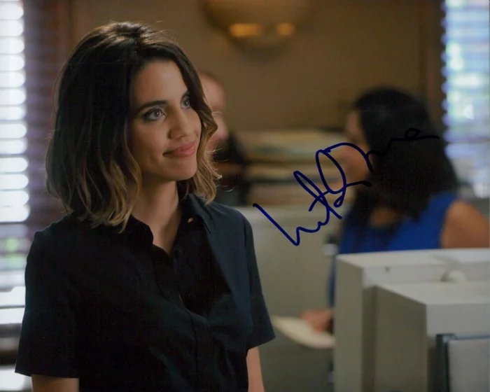Natalie Morales autograph