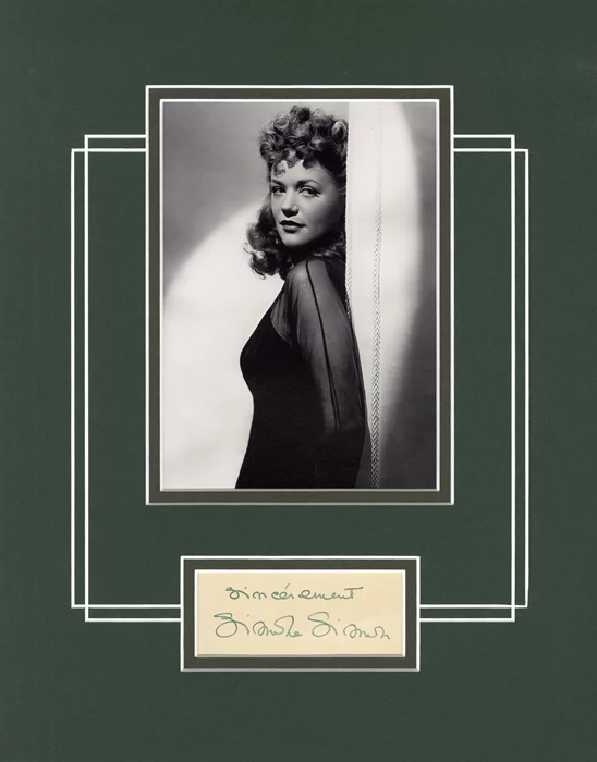 Simone Simon autograph