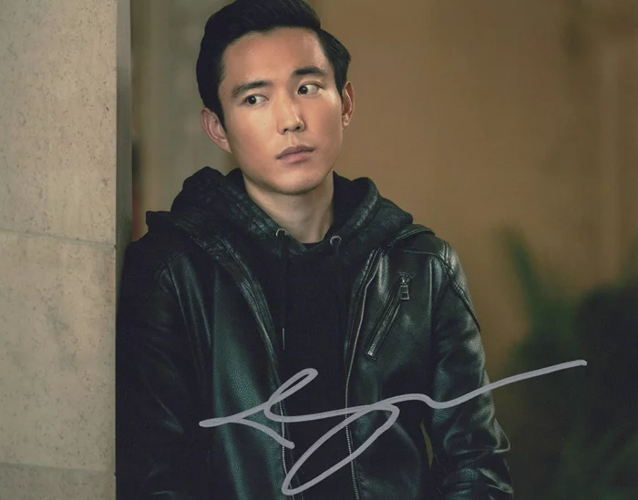 Justin H. Min autograph