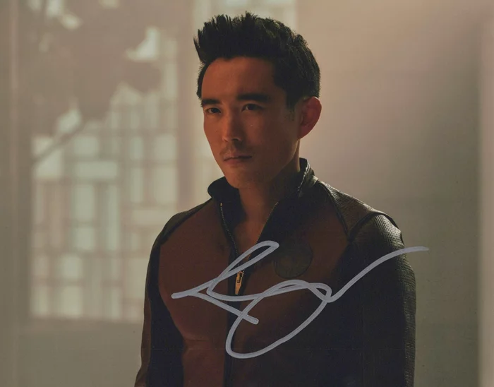 Justin H. Min autograph