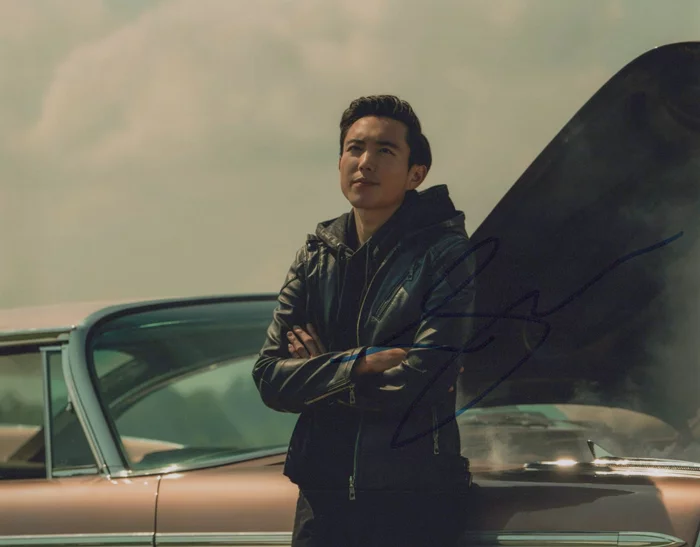 Justin H. Min autograph
